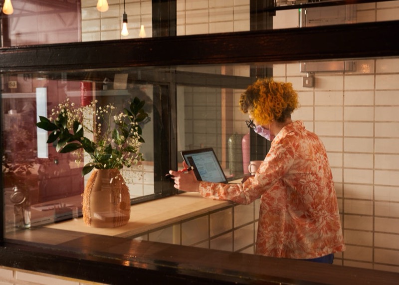 Working at the hatch in the shared space